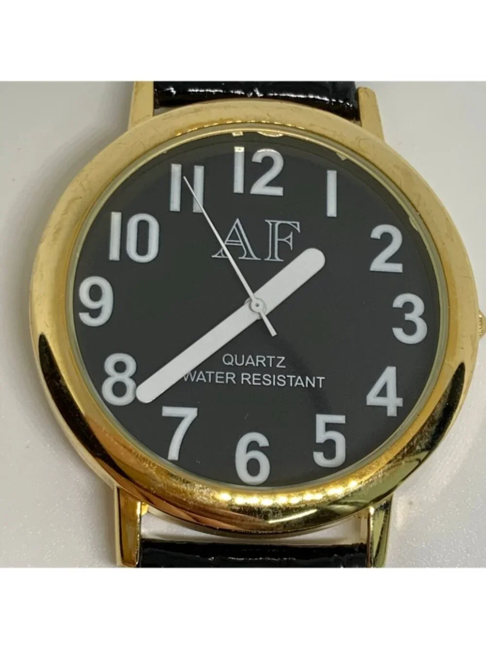 Quartz analog men’s watch gold tone 41mm easy reading black leather running